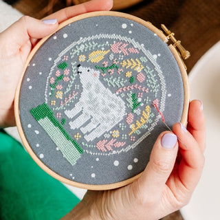 Polar bear snow globe Christmas cross stitch in hoop