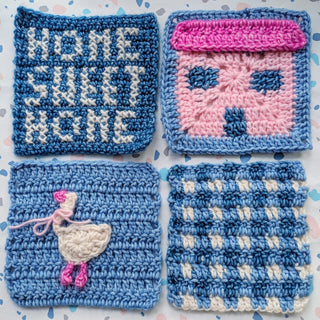 Collection of 4 crochet granny square coasters in blue, with cute designs on each.