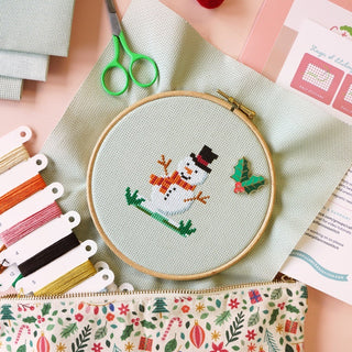 Snowman Christmas cross stitch design with supplies