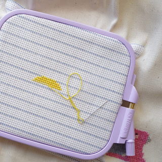 Cross stitching on waste canvas with embroidery hoop