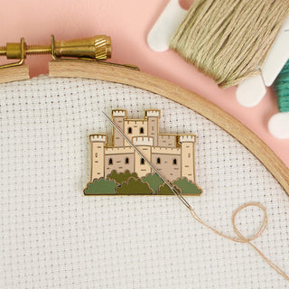 Castle enamel needle minder