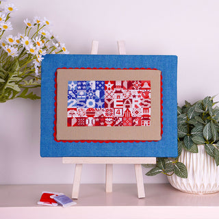 Liberty Stitches Cross Stitch Kit stitched sample on display stand
