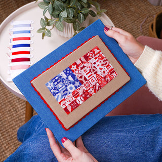 Liberty Stitches Cross Stitch Kit - Stitched sample in hand