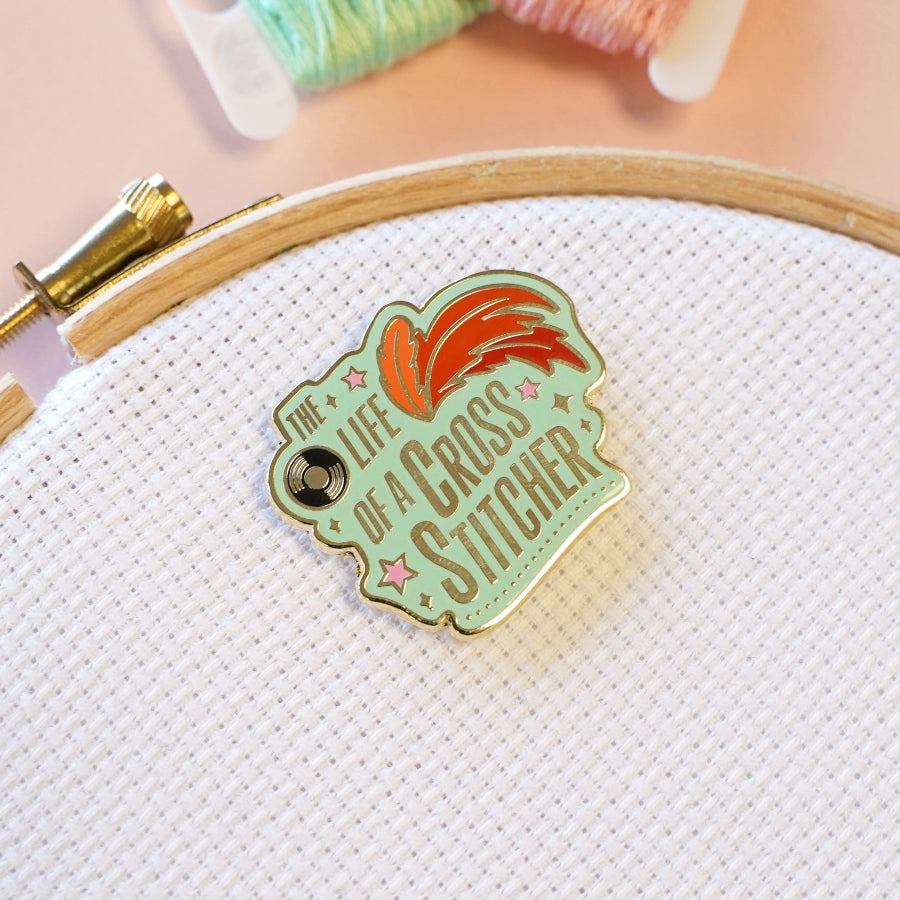 The life of a cross stitcher needle minder