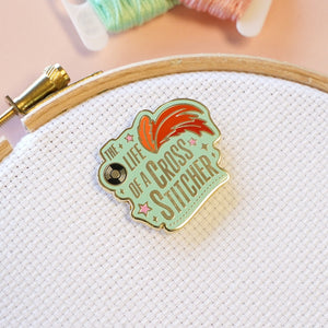 The life of a cross stitcher needle minder