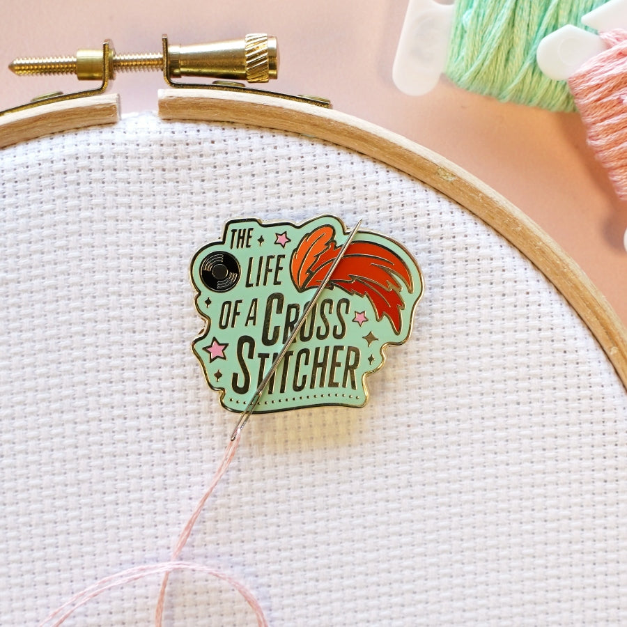 The life of a cross stitcher needle minder