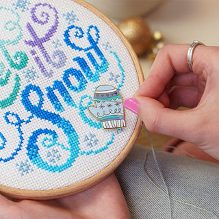 Mittens needle minder with Snow Flurry cross stitch kit