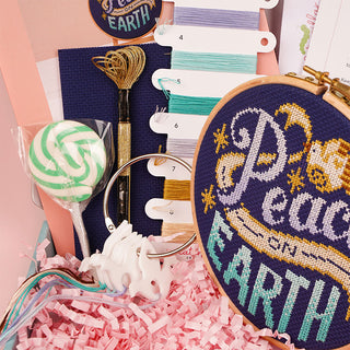 Peace on Earth Caterpillar Club Box Close Up