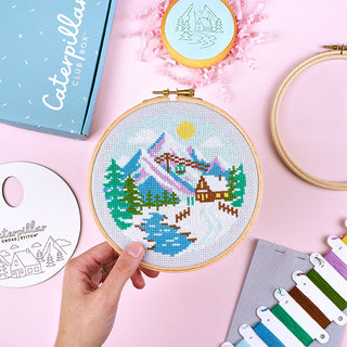 Snowy Peaks with hoop in hand