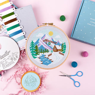 Sub Box 34 Snowy Peaks, Hoop Buddy, Elbesee Hoop and Iced Cookie close up flatlay