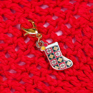 Stocking Stitch Marker on red yarn 