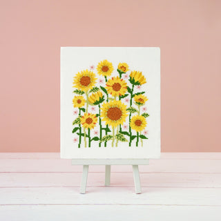 Sunflower cross stitch pattern on stand