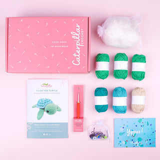Flatlay of Tilda the Turtle crochet kit contents