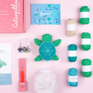 Flatlay of Tilda the Turtle crochet kit contents
