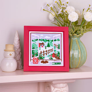 Winter View Cross Stitch Kit Stitch Sample on fireplace