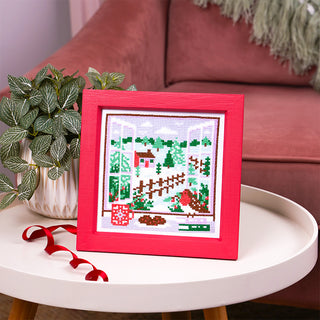 Winter View Cross Stitch Kit Stitch Sample on Coffee Table
