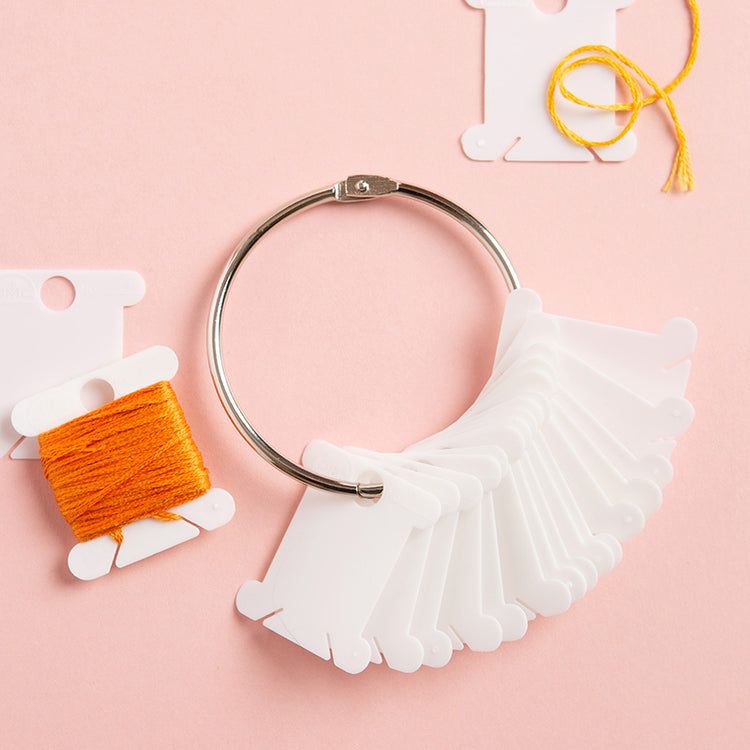 DMC Plastic Bobbins and Metal Ring Set | Caterpillar Cross Stitch